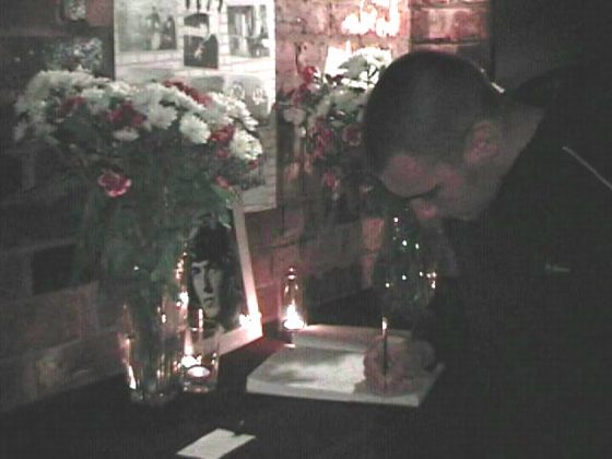 A fan signing The Book Of Rememberance